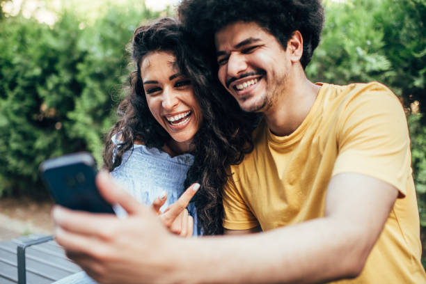 istock Latino couple enjoying outdoors at beautiful sunny day 2195576127