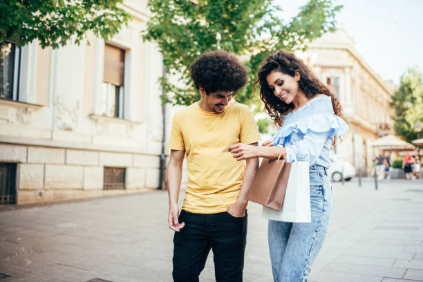 istock Latino couple enjoying outdoors at beautiful sunny day 2195576359