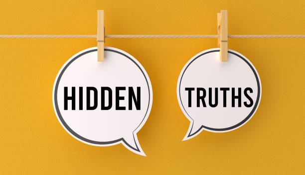 istock Hidden truths text hanging on a clothespin speech bubble. 3D render. 2195579311