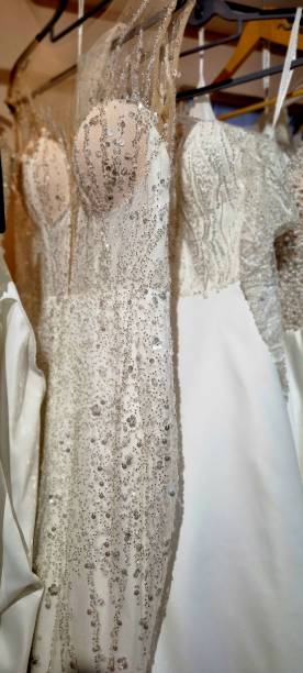 istock Elegant Beaded Bridal Gowns on Display 2195583431