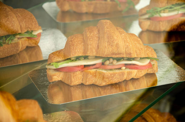 istock A showcase with sandwiches and sandwiches behind glass 2195585751