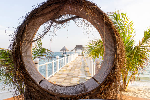istock Circular beach chair and pier 2195588395
