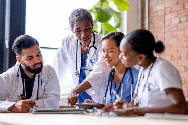 istock Doctor Meeting with Medical Students 2195589370