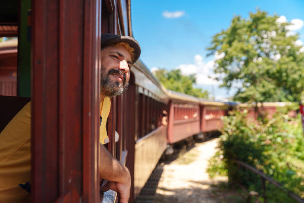 Man traveling by train in Brazil