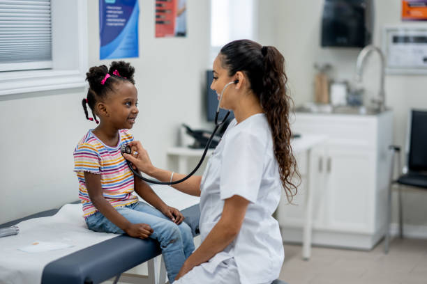 istock Little Girl at a Check-Up 2195598160