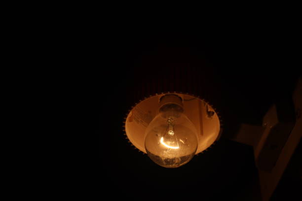 Close of a yellow light lamp in dark