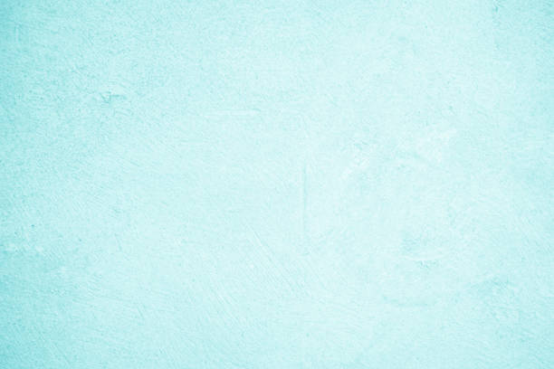 Blue light concrete texture for background in summer wallpaper. Cement colour and sand wall of tone vintage. Abstract teal light color. Cement grain texture paint watercolor for design decoration.