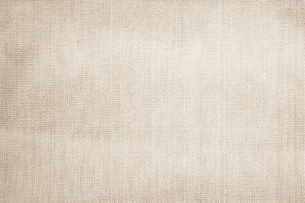 istock Brown sackcloth woven texture background in natural pattern. Jute hessian burlap, linen background in light beige cream color blank. Weaving canvas fiber line cotton cloth textured as organic. 2195600871