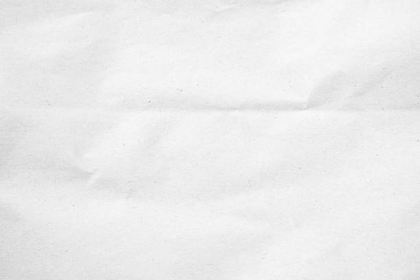 istock White recycled craft paper texture as background. Grey paper texture, Old vintage page or grunge vignette of old newspaper. Pattern rough art creased grunge letter. Hardboard with copy space for text. 2195600879