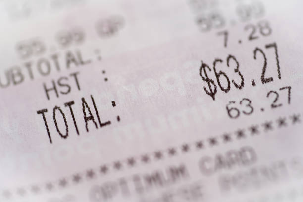istock Total amount and HST (Harmonized sales tax) in dollars on a receipt. 2195604140