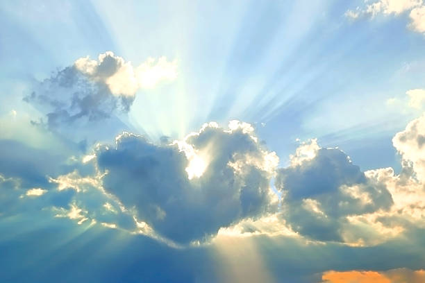 Cloud Heart Shape and Sunbeam Nature Background