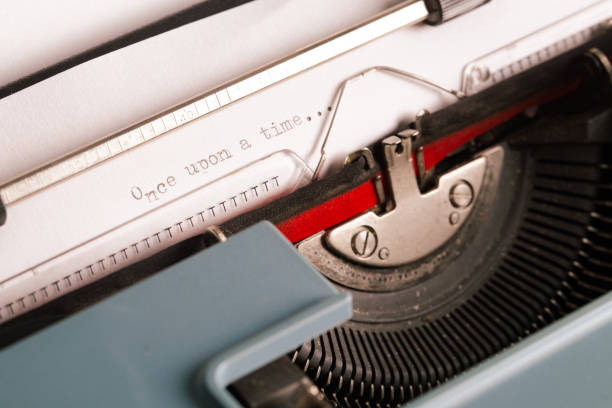 istock Once upon a time written on a white paper on an old typewriter machine close up 2195617751