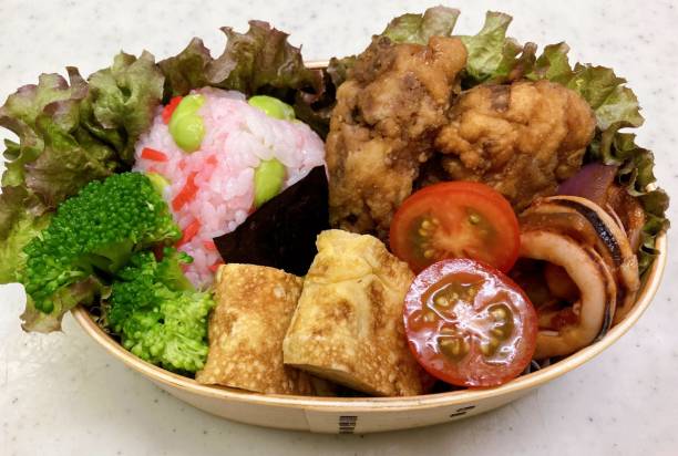 istock A traditional Korean dosirak, beautifully arranged with rice, assorted banchan, and savory proteins. Balanced and visually inviting, it’s a portable meal packed with vibrant flavors. 2195618465
