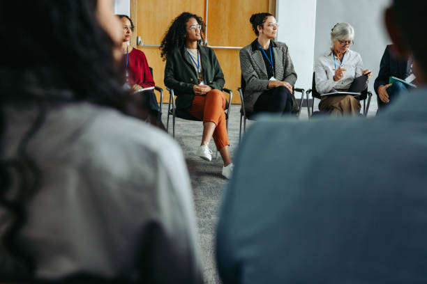 istock Diverse group of professionals seated in a meeting during a networking event 2195619105