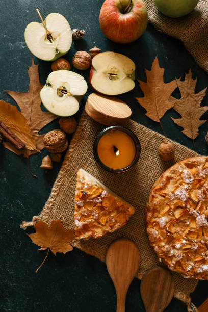 istock Candle and homemade apple pie, autumn mood 2195619891
