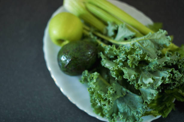 Green vegetables and fruits on a plate, Superfoods