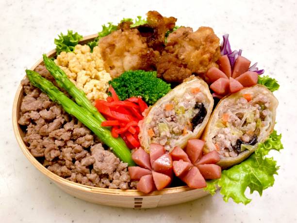 istock A traditional Korean dosirak, beautifully arranged with rice, assorted banchan, and savory proteins. Balanced and visually inviting, it’s a portable meal packed with vibrant flavors. 2195620768