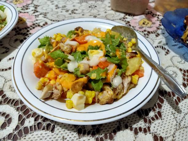 istock Colorful Chicken Salad with Corn, Tomatoes, and Cheese 2195625795