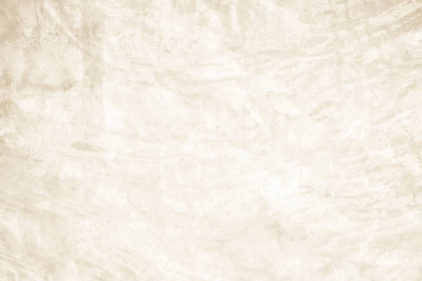 istock Dark old concrete wall texture background. Close Up retro plain cream color cement wall background texture. Design paper vintage parchment element show or advertise or promote product on display. 2195626950