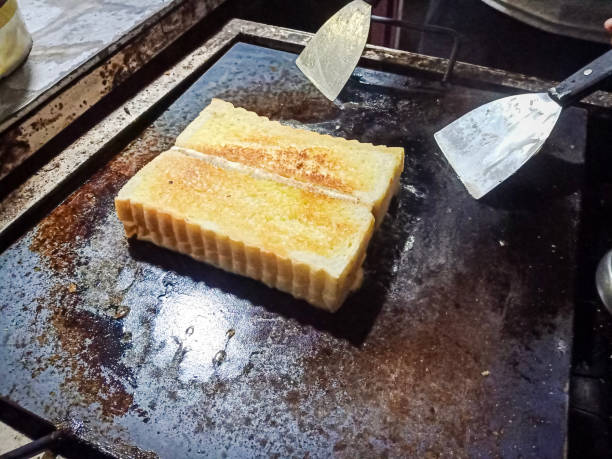 istock Roti bakar Bandung. Bread toast with chocolate jam topping. Popular street food from West Java, Indonesia 2195629349