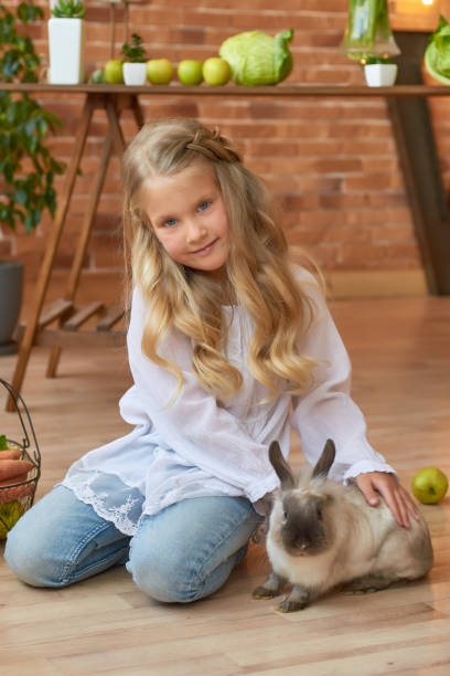 istock Happy Easter griting card. Family mother and cild on Easter kitchen 2195639794