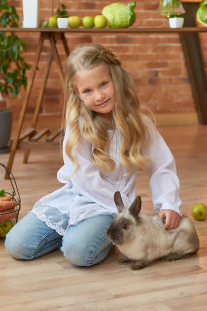 istock Happy Easter griting card. Family mother and cild on Easter kitchen 2195639797