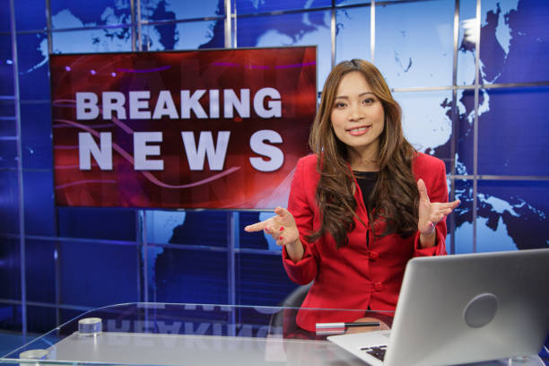 istock Female breaking news anchor 2195645671