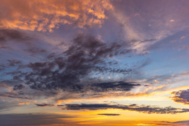 istock Serene Cloudscape at Sunset with Colorful Sky and Soft Clouds 2195649228
