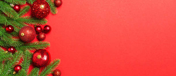 istock Christmas composition made of fir tree, balls and different decorations on colorful background. Top view of New Year Advent concept with empty space for your design 2195649280