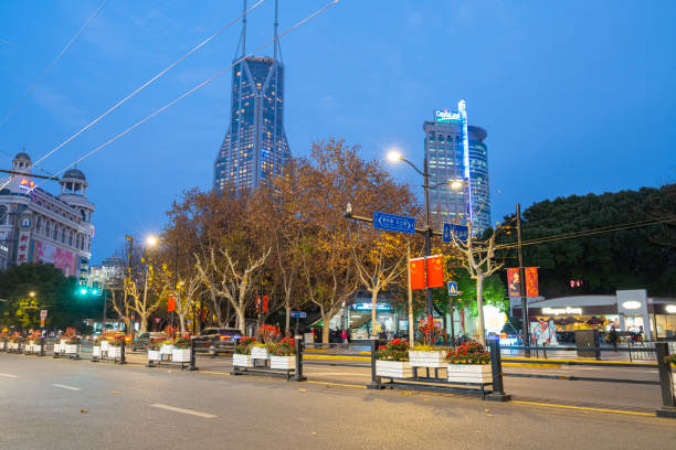 Shanghai, China. January 9, 2025.  view at dusk of the modern buildings in Piazza del Popolo in the city centre