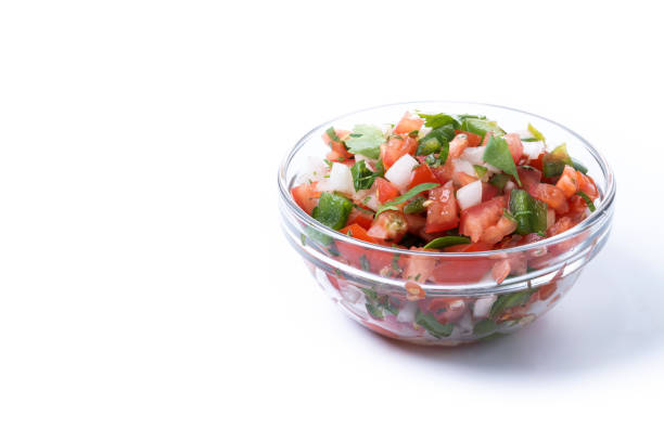 istock Traditional Mexican Pico de Gallo sauce isolated on white background 2195656564