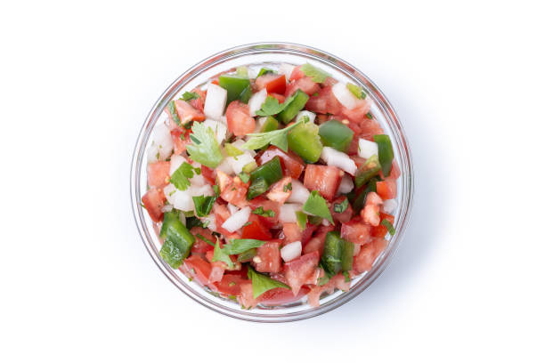istock Traditional Mexican Pico de Gallo sauce isolated on white background 2195656573