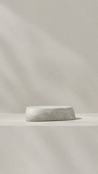 istock 3D background with gray tones and a podium set, featuring a play of light and shadow. An abstract geometric composition in a minimalist design. designed as a fashion stage for showcasing mockup scene 2195656788