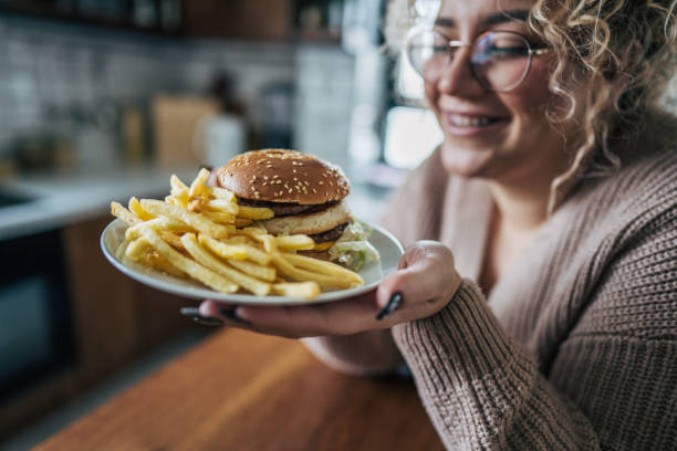 istock A woman offering a treat 2195657085