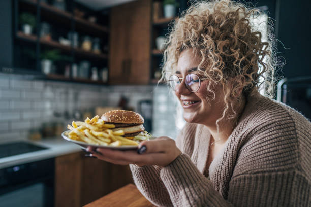 istock A woman offering a treat 2195657258