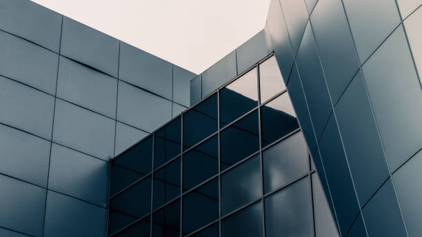 istock facade of the building with blue panels and reflective surfaces 2195657355