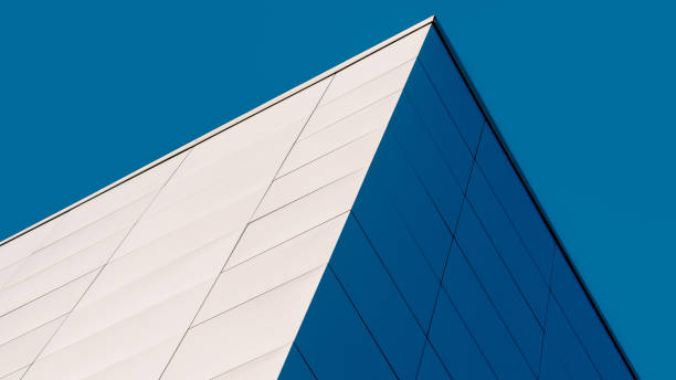 istock fragment corner of a modern building on a blue background 2195657528
