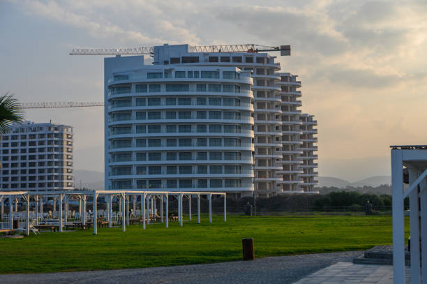 istock Modern architecture emerges at sunset in a developing coastal resort area 2195658532