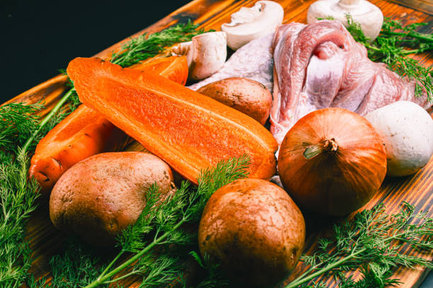 Preparing Roasted Chicken with Root Vegetables in Domestic Kitchen