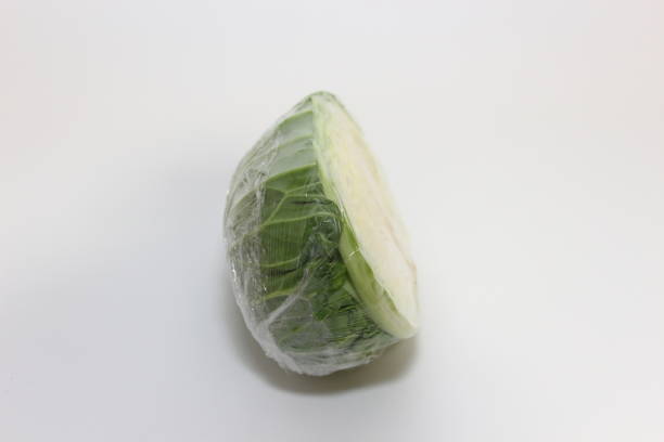 istock A cross-section of a cabbage floating on a white background 2195662340