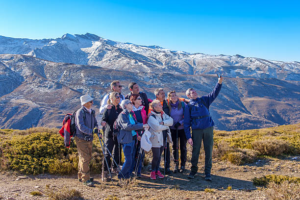 istock Group of Hikers Taking a Selfie in Sierra Nevada 2195663679