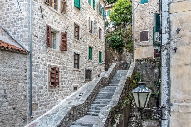 istock Narrow stone steps leading between historic buildings in Kotor, Montenegro 2195663911