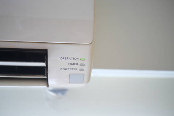 air conditioner on a wall at home .