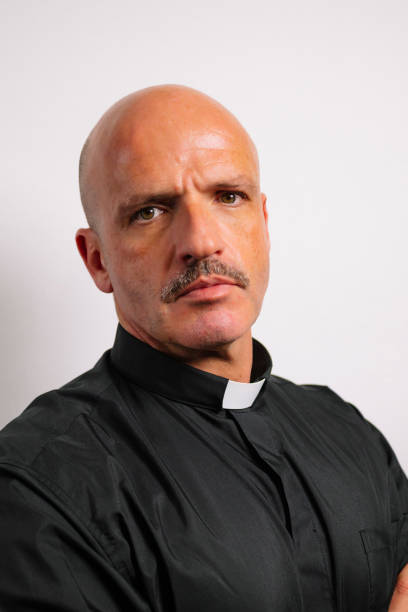 istock Portrait of a priest looking at the camera. 2195666301