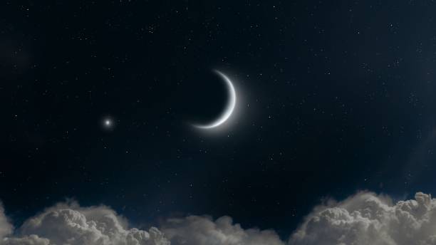 istock Crescent moon and large star in the night sky. 2195667241
