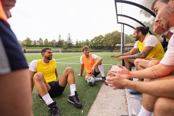istock Group of Soccer Players Taking a Break During Practice Session 2195669630
