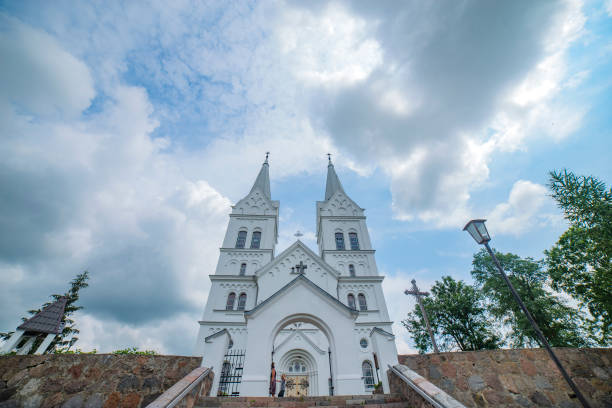 istock white catholic church. Braslav lakes. 2195674855