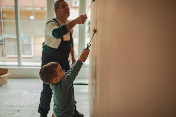 istock Painters, grandfather and grandson 2195676676