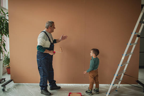 istock Painters, grandfather and grandson 2195676794