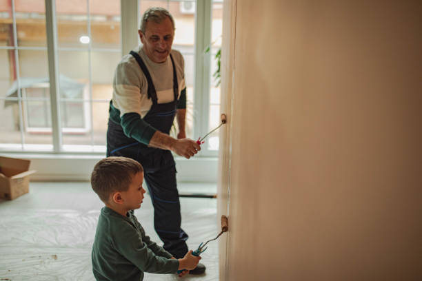 istock Painters, grandfather and grandson 2195676848